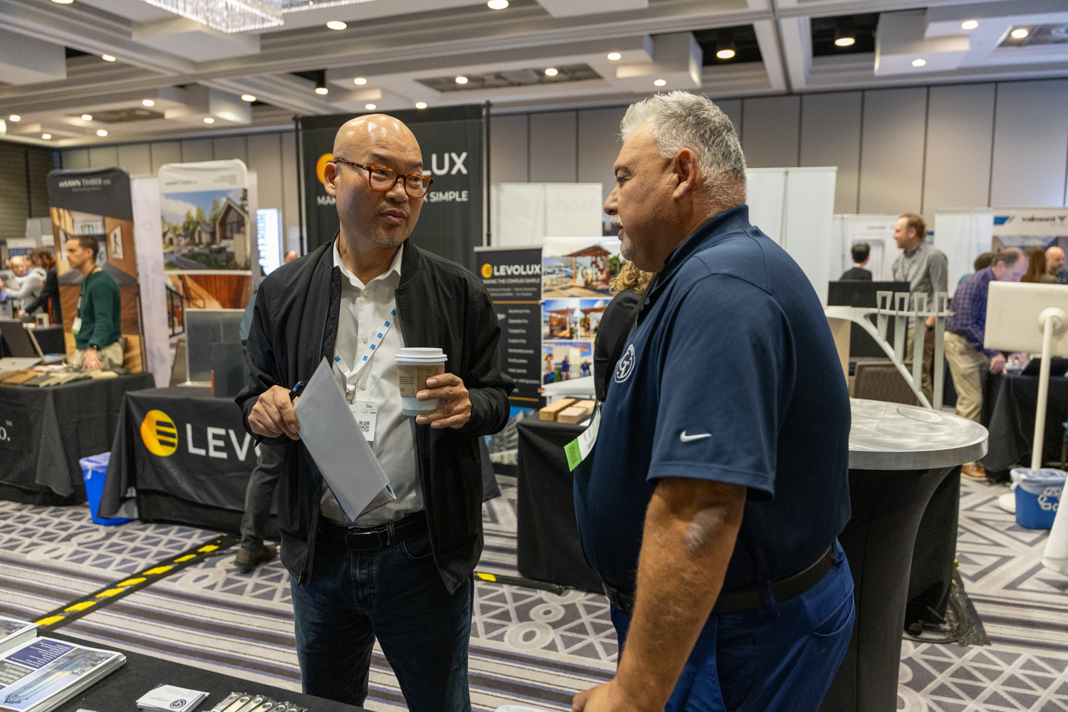Glasswerks Sales Manager Louie Plascencia advising one of Facades+'s attendees Glasswerks' capabilities and how we can contribute to any facade project.