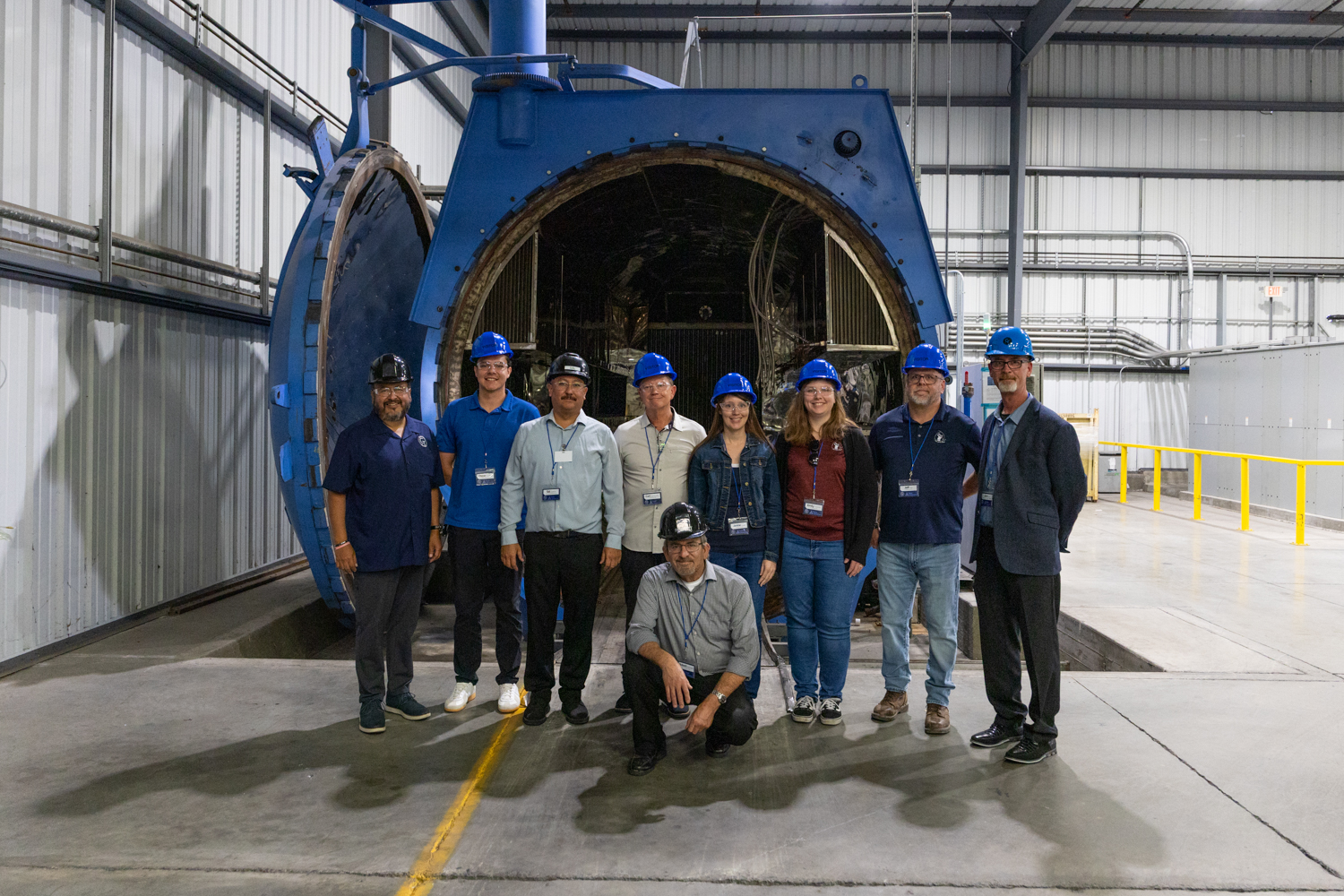 The group in front of our laminating autoclave — a key piece of equipment for producing high-performance laminated glass.