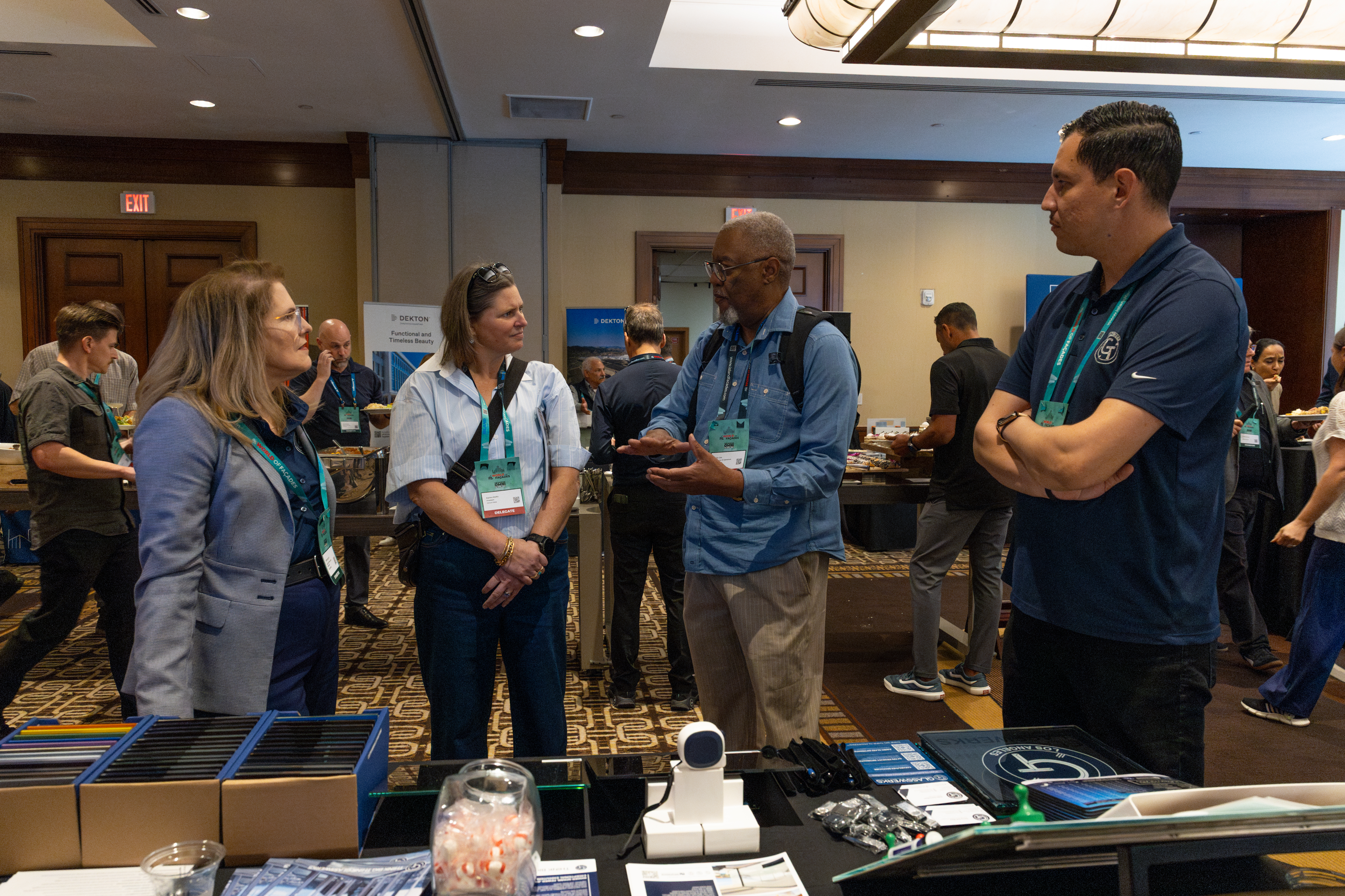Glasswerks Sales Managers Terry Del Rey and Aldo Gonzalez discussing glass products and fabrication capabilities with building industry professionals at Zak World of Façades LA 2026.